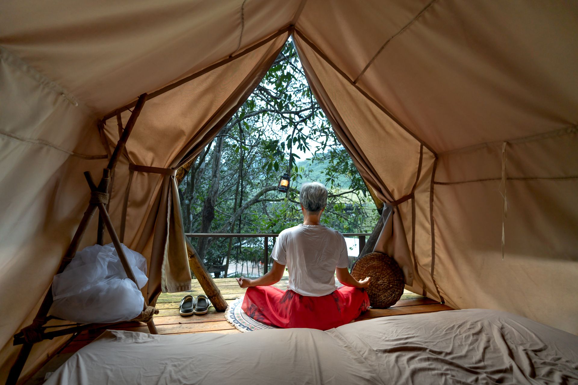 Meditative post looking out of a cabin