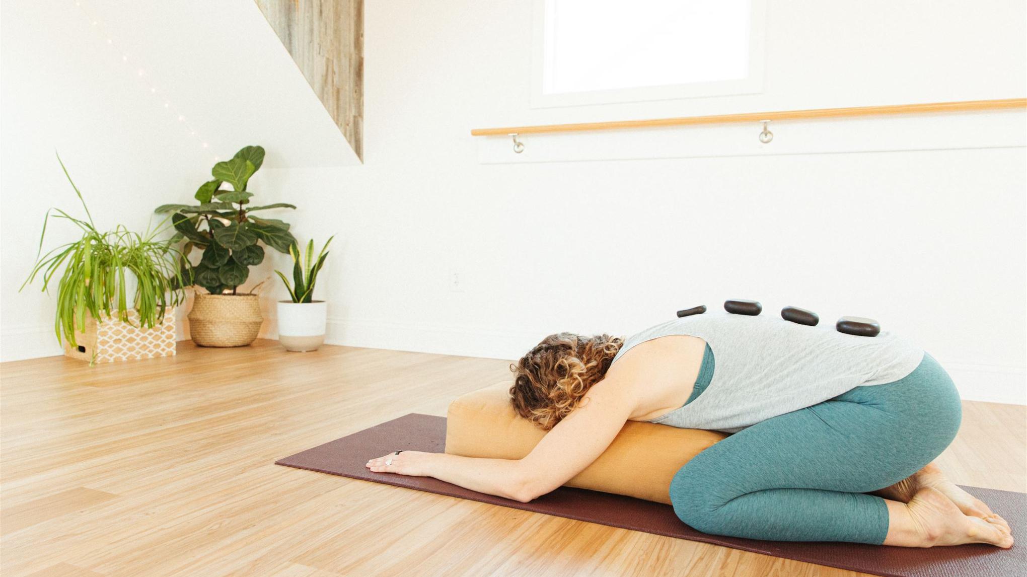 MADISON | Hot Stone & Aromatherapy Restorative Yoga with Sound Healing